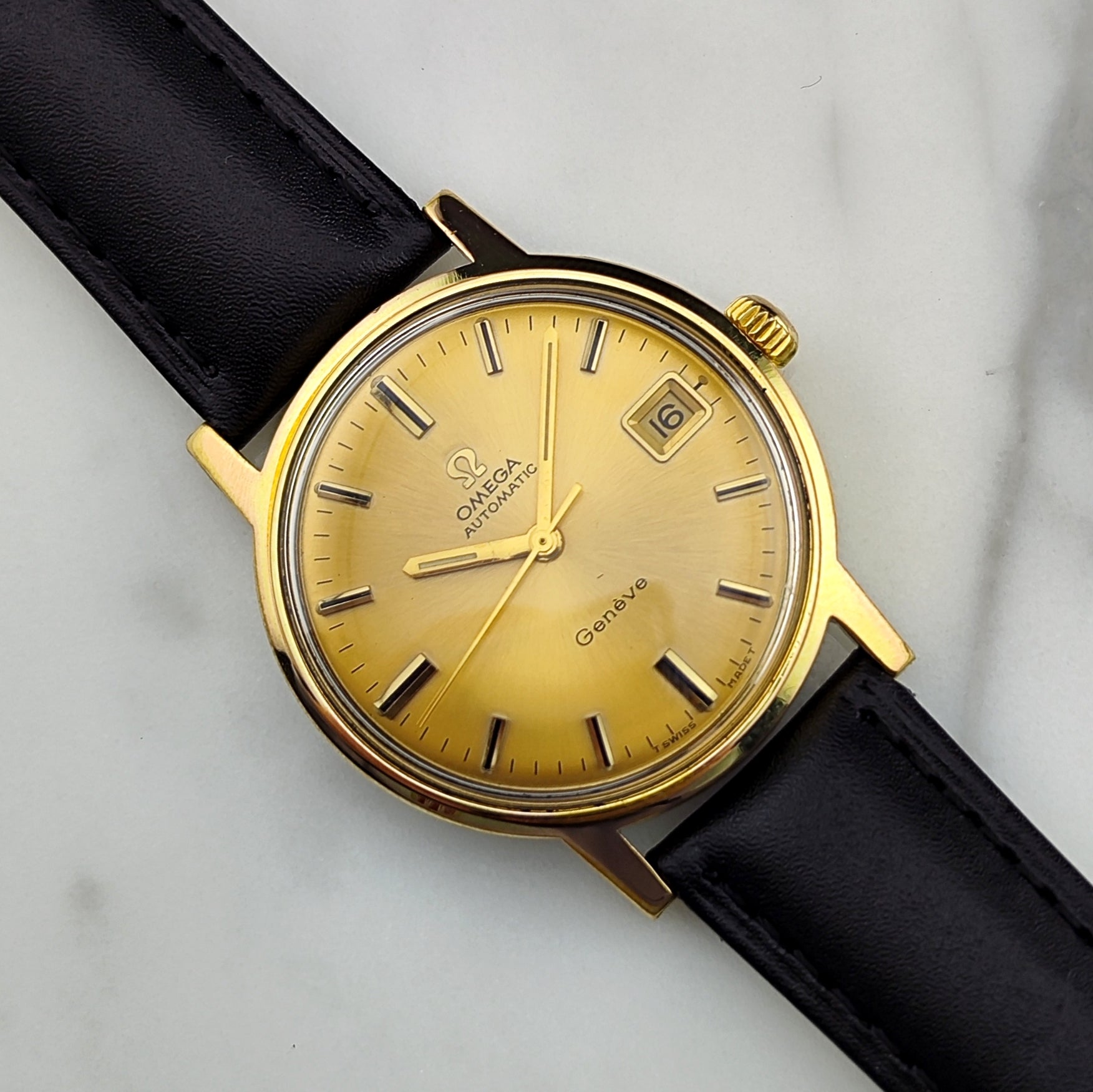 OMEGA Genève Automatic Gold Date Ref. 166.070 – Aigner & Fuchs
