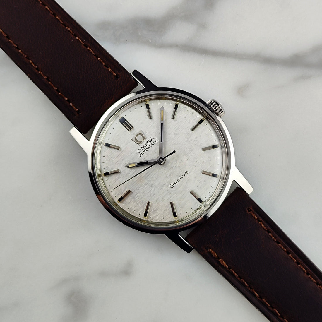 Omega Genève Ref. 165.070 (1969) – Seltenes Mosaic Linen Dial mit originalem Omega-Glas