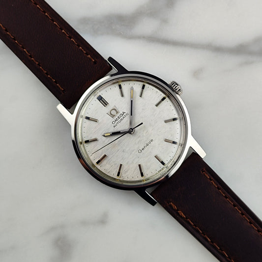 Omega Genève Ref. 165.070 (1969) – Seltenes Mosaic Linen Dial mit originalem Omega-Glas