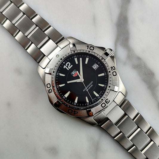 TAG Heuer Aquaracer 300M WAF1110 (2005) – Schwarzes Zifferblatt, Box & Saphirglas Taucheruhr