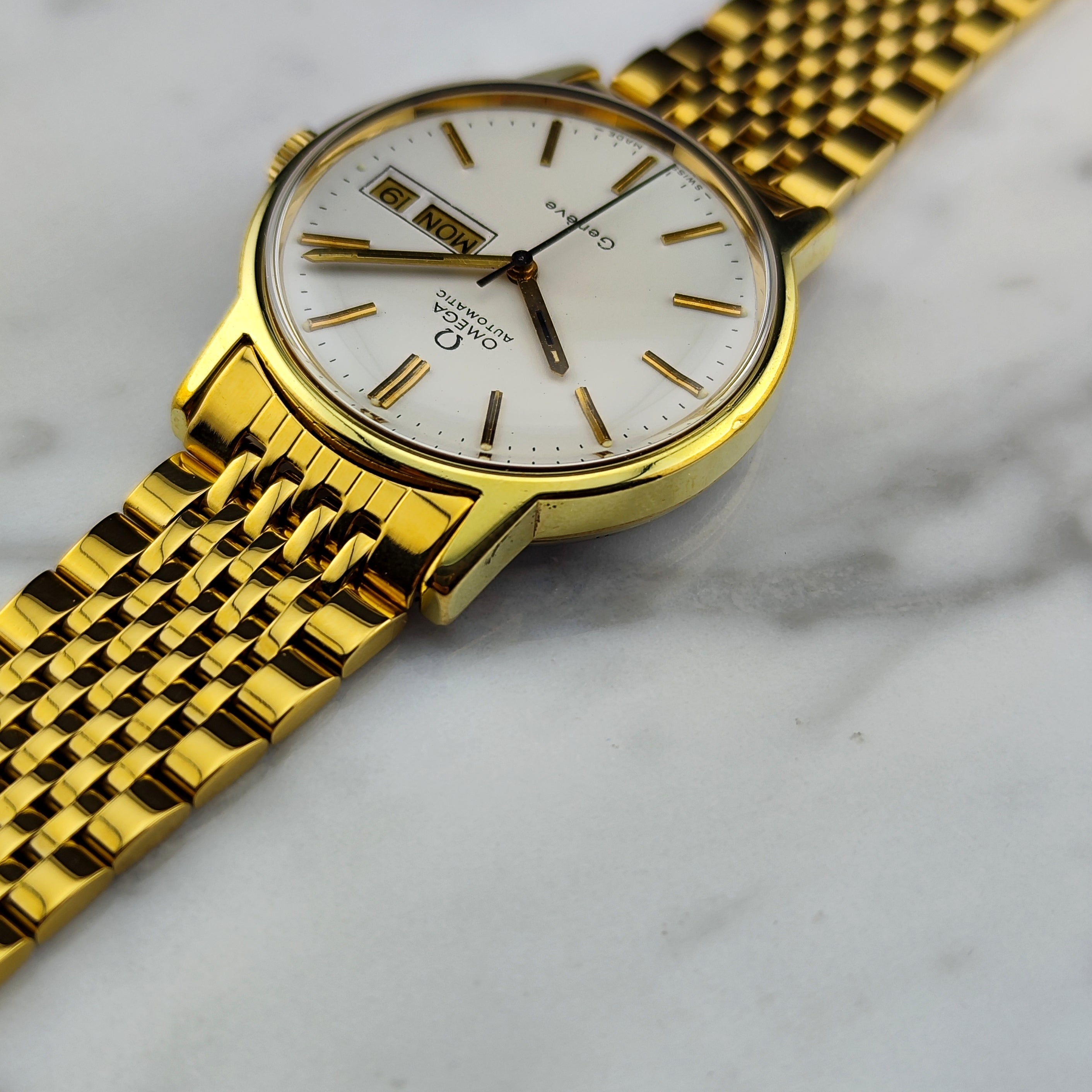 Omega Genève Automatic Day-Date Gold Ref. 166.0117 – Aigner & Fuchs