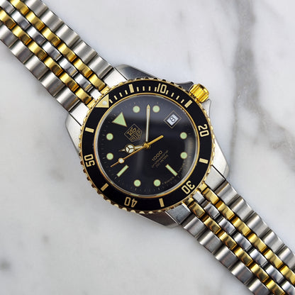 TAG Heuer Professional 1000 Two-Tone Black Dial – Schrägansicht mit Zifferblatt und Armband